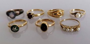 An assortment of seven 9ct gold gem-set rings, mixed sizes, all hallmarked, 17.2g (7)