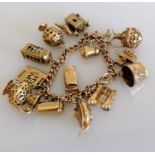 A vintage gold charm bracelet with an assortment of 9ct gold charms, all hallmarked, 95g
