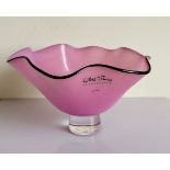 A Gillies Jones Rosedale purple glass bowl with crimped black rim on a short pedestal foot, 9.5 cm