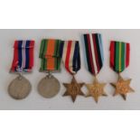 A WW2 medal group to include: 1939-1945 medal, Defence medal and replicas of Pacific Star, France