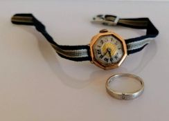 An early 20th century ladies wristwatch with an octagonal 9ct yellow gold case, Arabic numerals on a