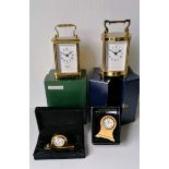 Two David Peterson carriage clocks, two smaller Imperial clocks, all battery operated, as new and