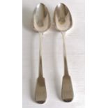 A pair of George III fiddle pattern silver basting or stuffing spoon, monogrammed, by Stephen Adams,