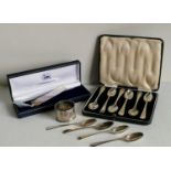 A George V cased set of six silver coffee spoons by W H Haseler Ltd., Birmingham, 1922; four