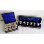 A George V cased set of six miniature silver tygs retailed by Cooke & Kelvey, Calcutta & Simla, made
