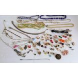 A selection of costume jewellery to include earrings, beaded necklaces, etc