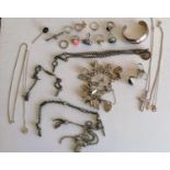 A silver charm bracelet, fob chains and other silver-based jewellery, together with an Art Nouveau-