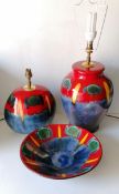 A Poole Pottery Infusion design purse lamp, 36 cm; Roman lamp, 46 cm and matching bowl, diameter