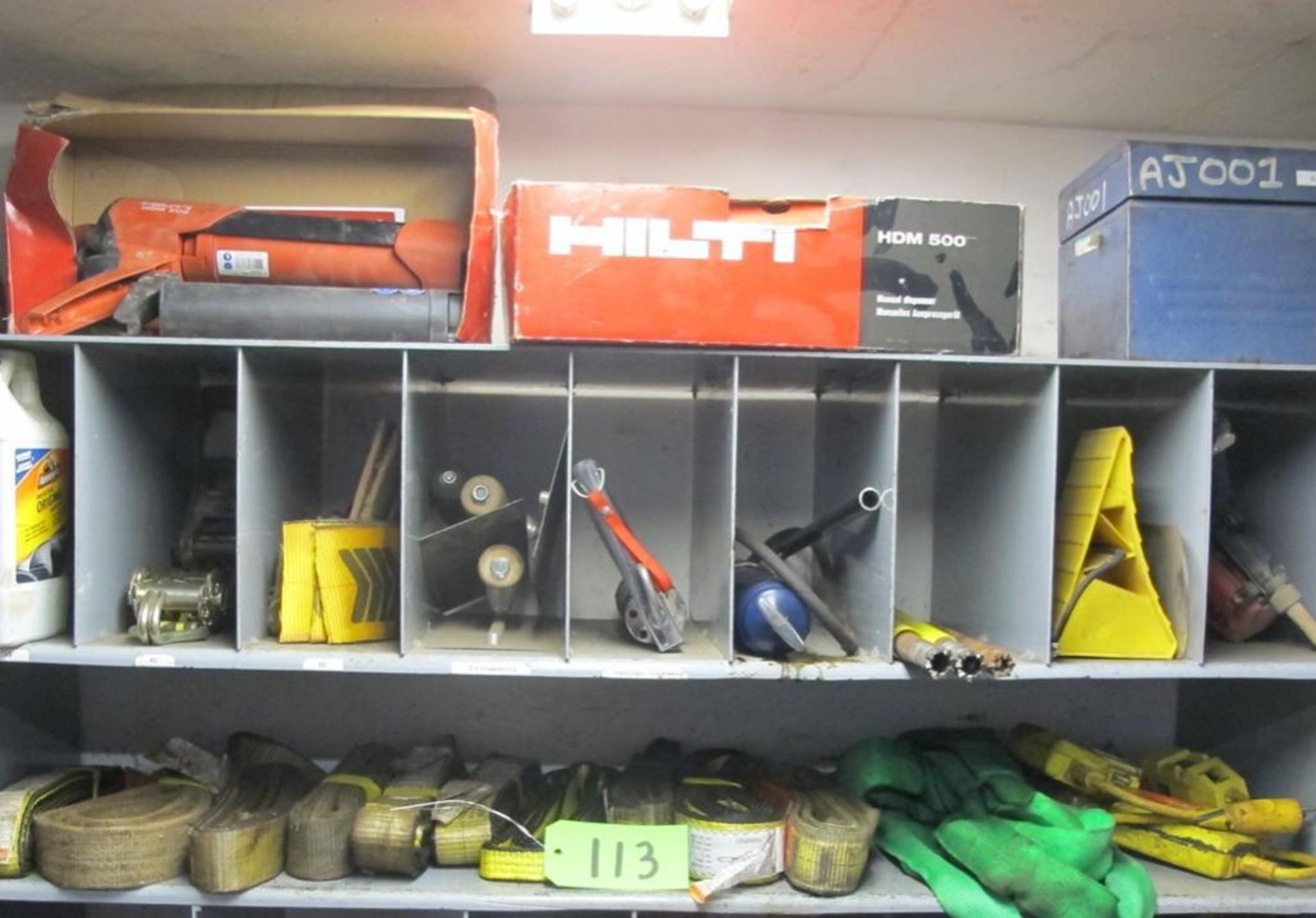 CONTENTS OF 2 UPPER SHELVES IN CAGE (INCL STRAPS, HILTI HDM 500 DISPENSERS, TOOL BOX, ROPES, FIRE BL