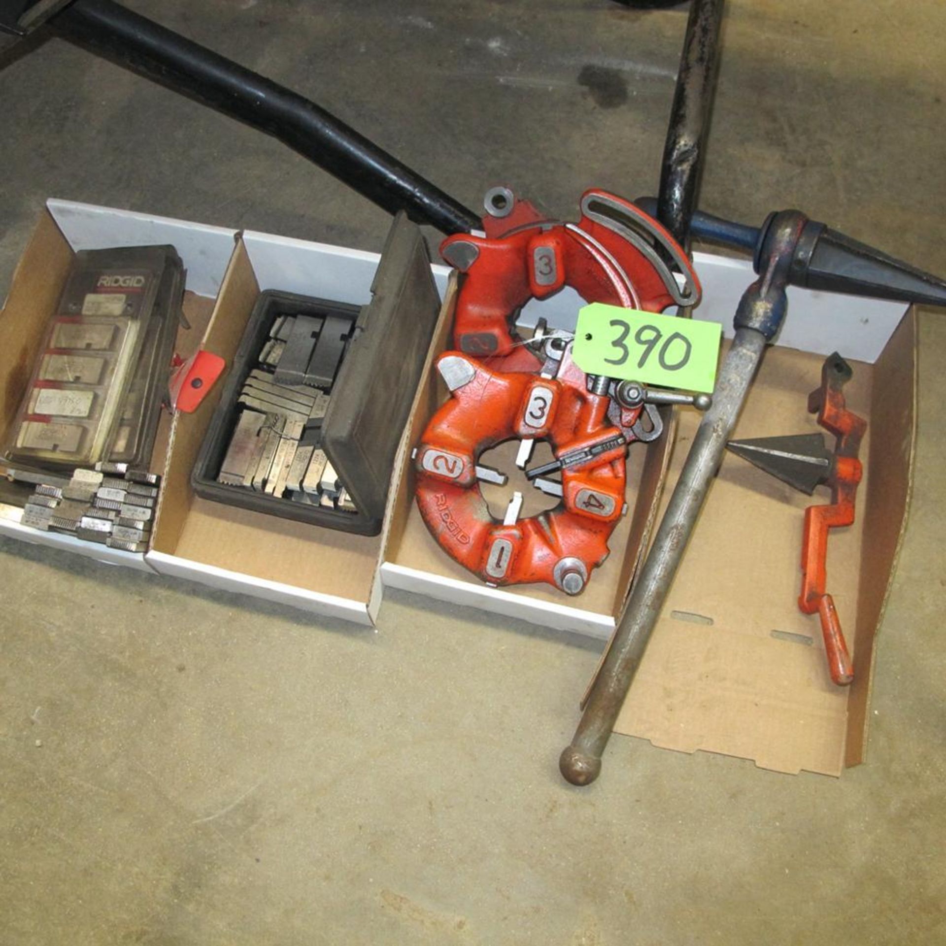 LOT OF 4 BOXES OF RIDGID PIPE DIES, HOLDERS AND ATTACHMENTS (WEST BLDG)