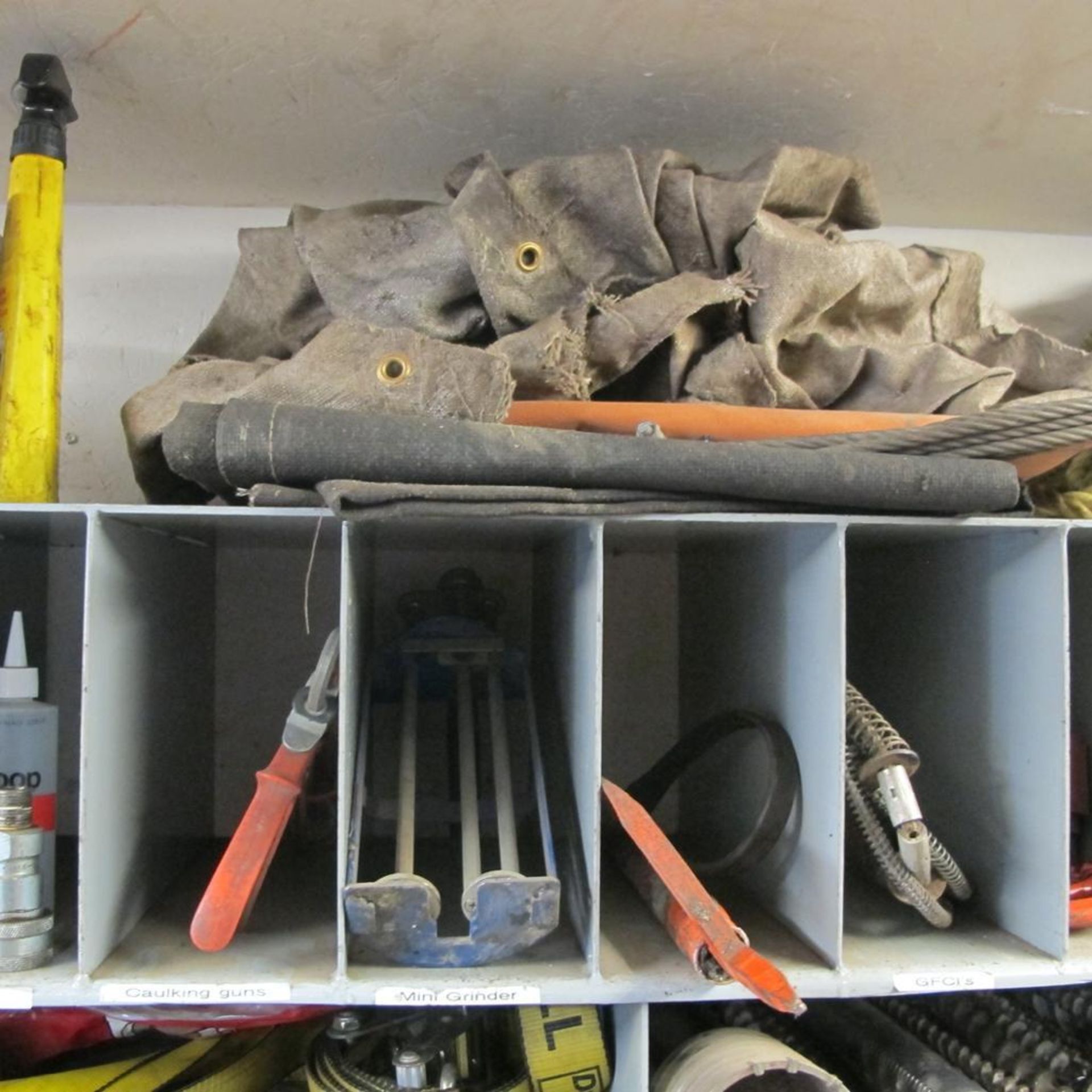 CONTENTS OF 2 UPPER SHELVES IN CAGE (INCL STRAPS, HILTI HDM 500 DISPENSERS, TOOL BOX, ROPES, FIRE BL - Image 3 of 6