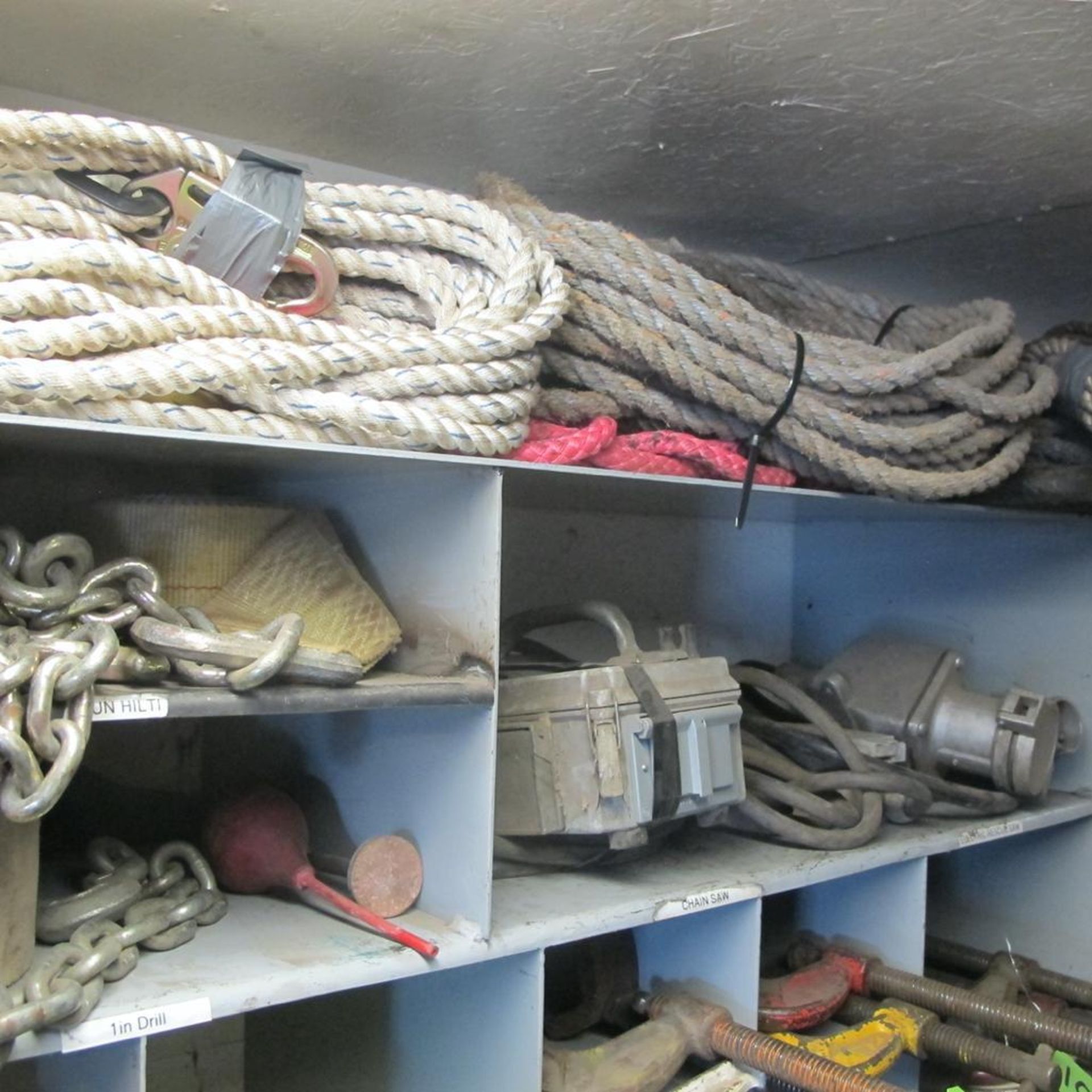 CONTENTS OF 2 UPPER SHELVES IN CAGE (INCL STRAPS, HILTI HDM 500 DISPENSERS, TOOL BOX, ROPES, FIRE BL - Image 5 of 6