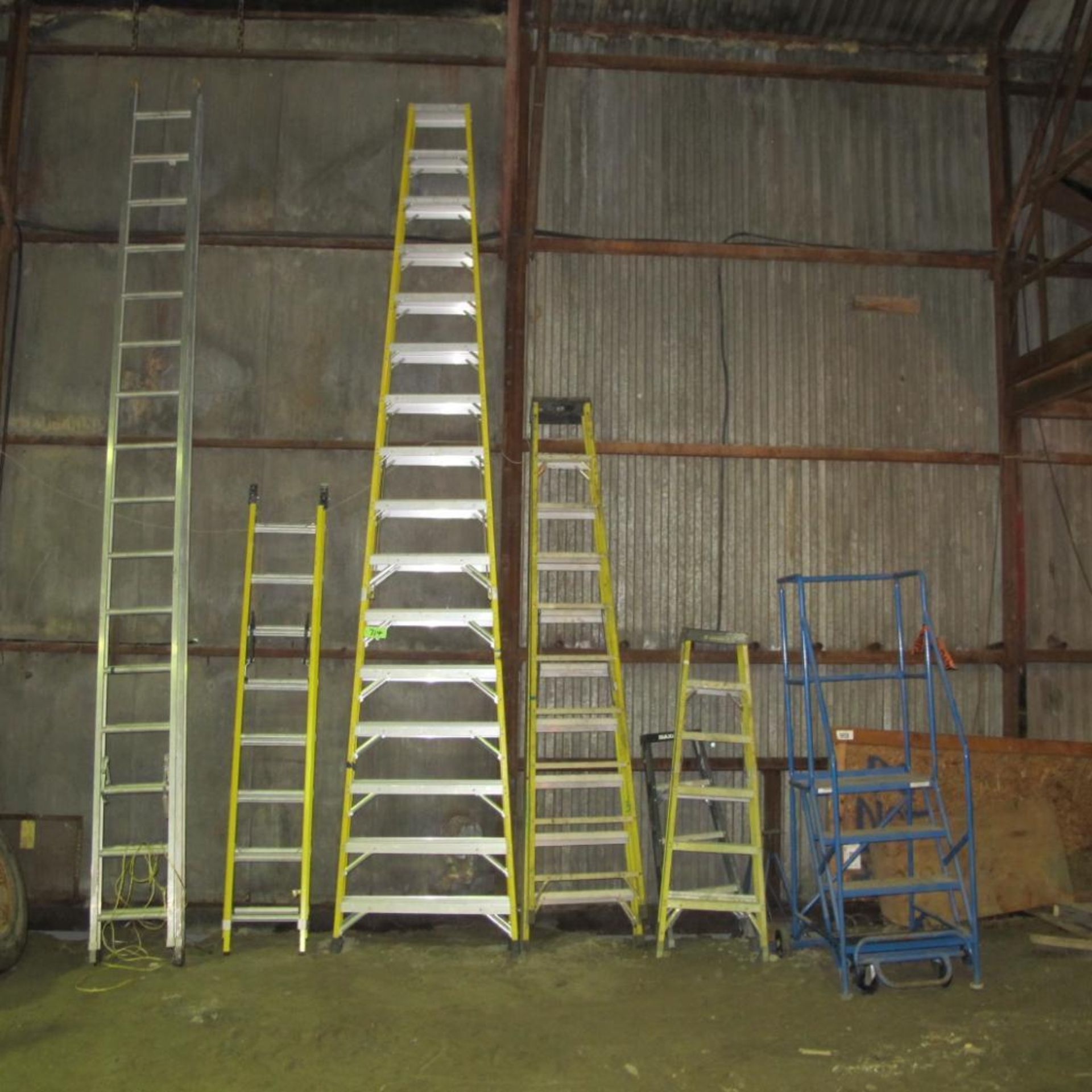 LOT OF 7 LADDERS, 16', 32' EXTENSION, 16' EXREURION, 10', 2 - 6', 4') AND CANWAY 4 STEP WAREHOUSE ST