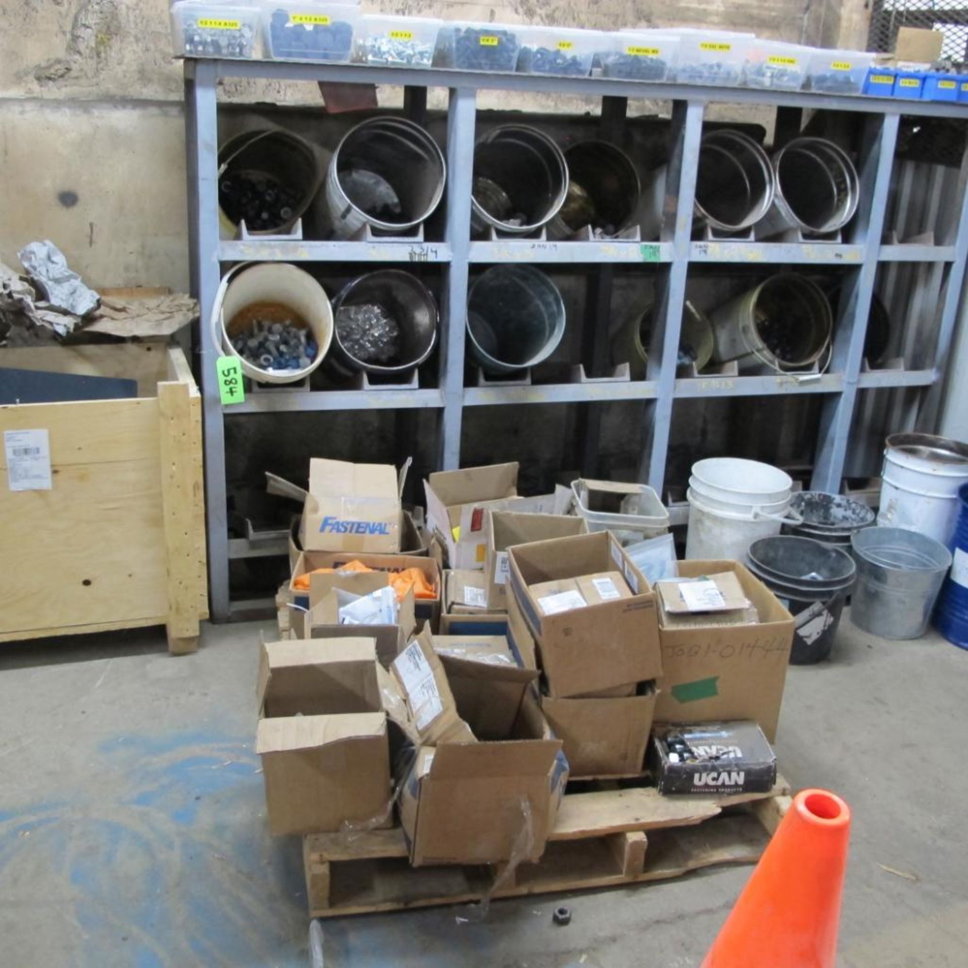LOT OF RACK W/BUCKETS OF FASTENERS W/PALLET OF FASTENERS/CRATE OF MACHINE GUARDS (LOWER CRIB)