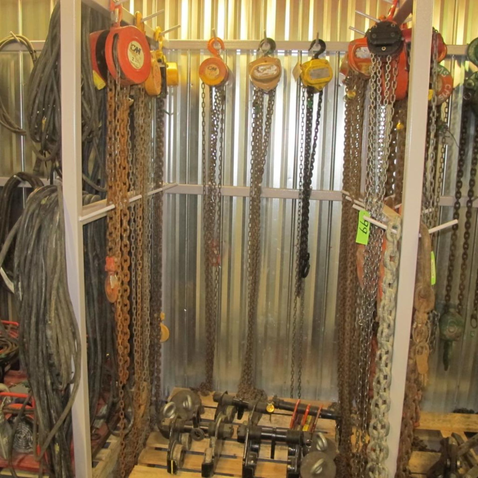 LOT OF 9 CHAIN HOISTS (3 - 2 TON/6 - 1 TON) W/4 TROLLIES AND 4 WEIGHTS ON RACK (UPPER TOOL CRIB)