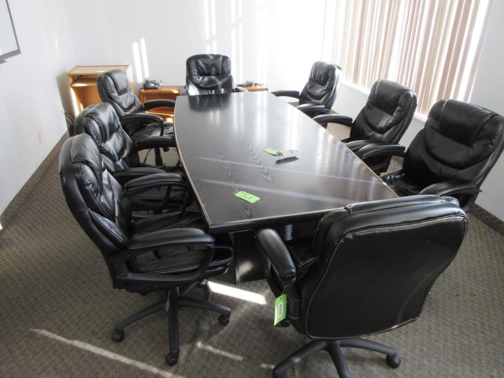 Boardroom contents: furniture only: 8' black boardroom table, 10 black arm chairs, lateral file cabi