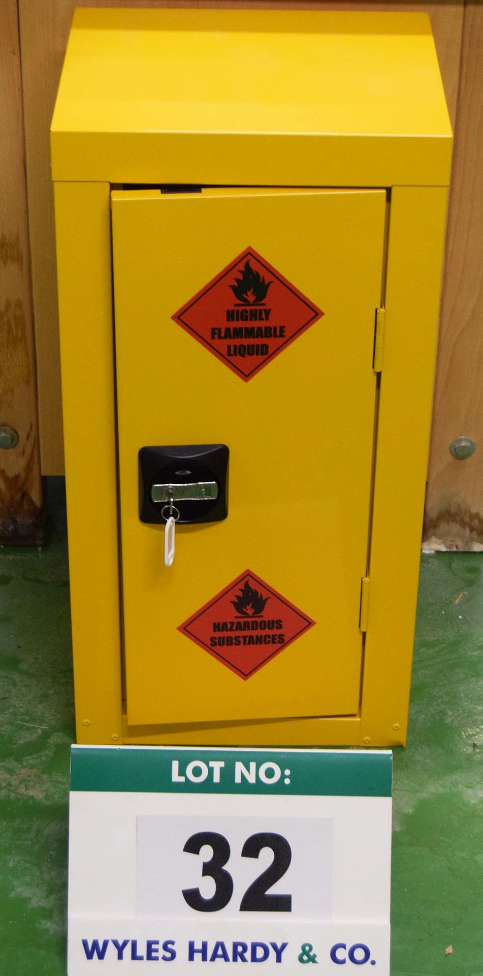 A Yellow Steel Benchtop Flammables Storage Cabinet (Key Held)