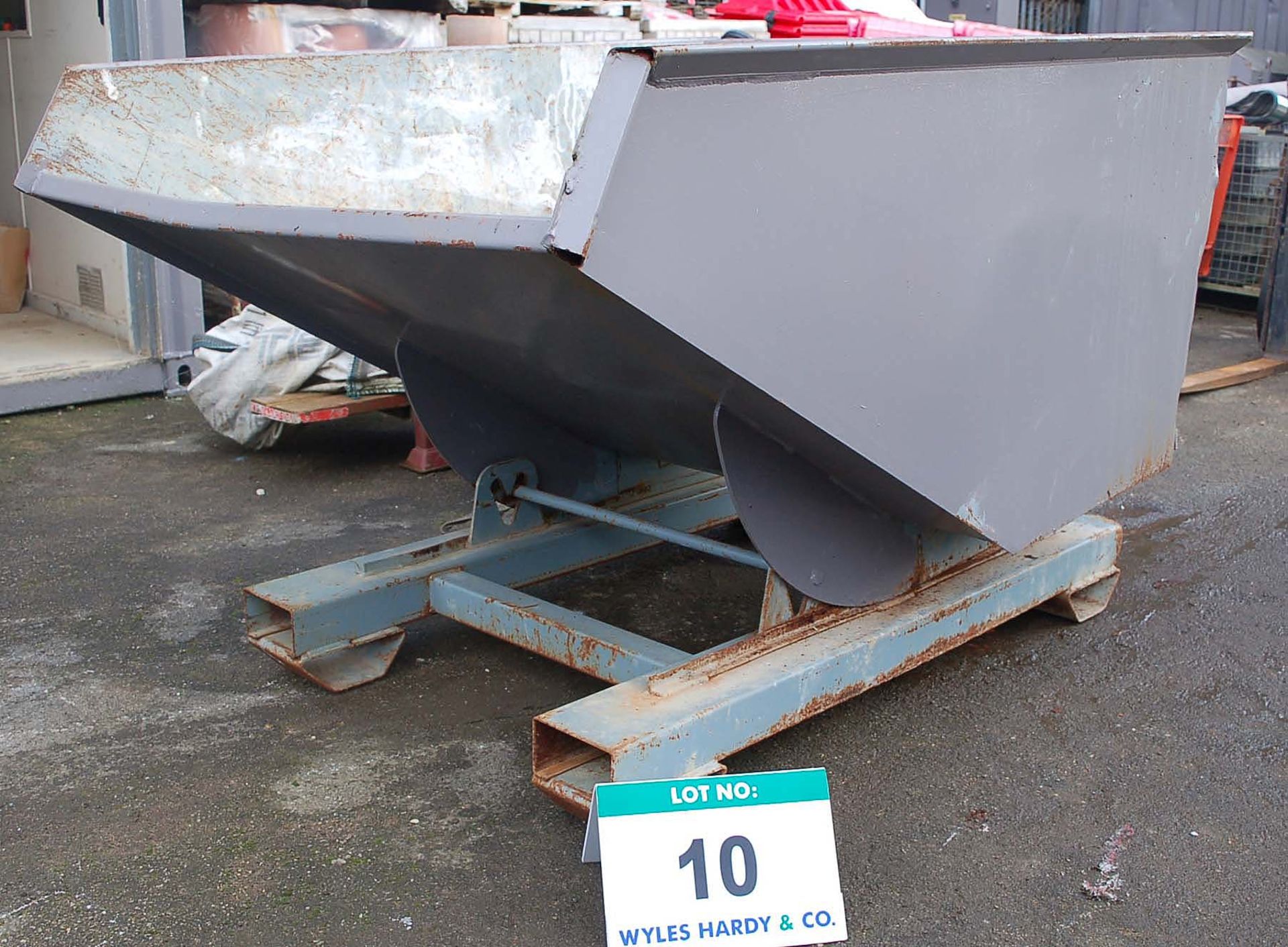 A One Cubic Meter Fork Lift Operated Tipping Skip