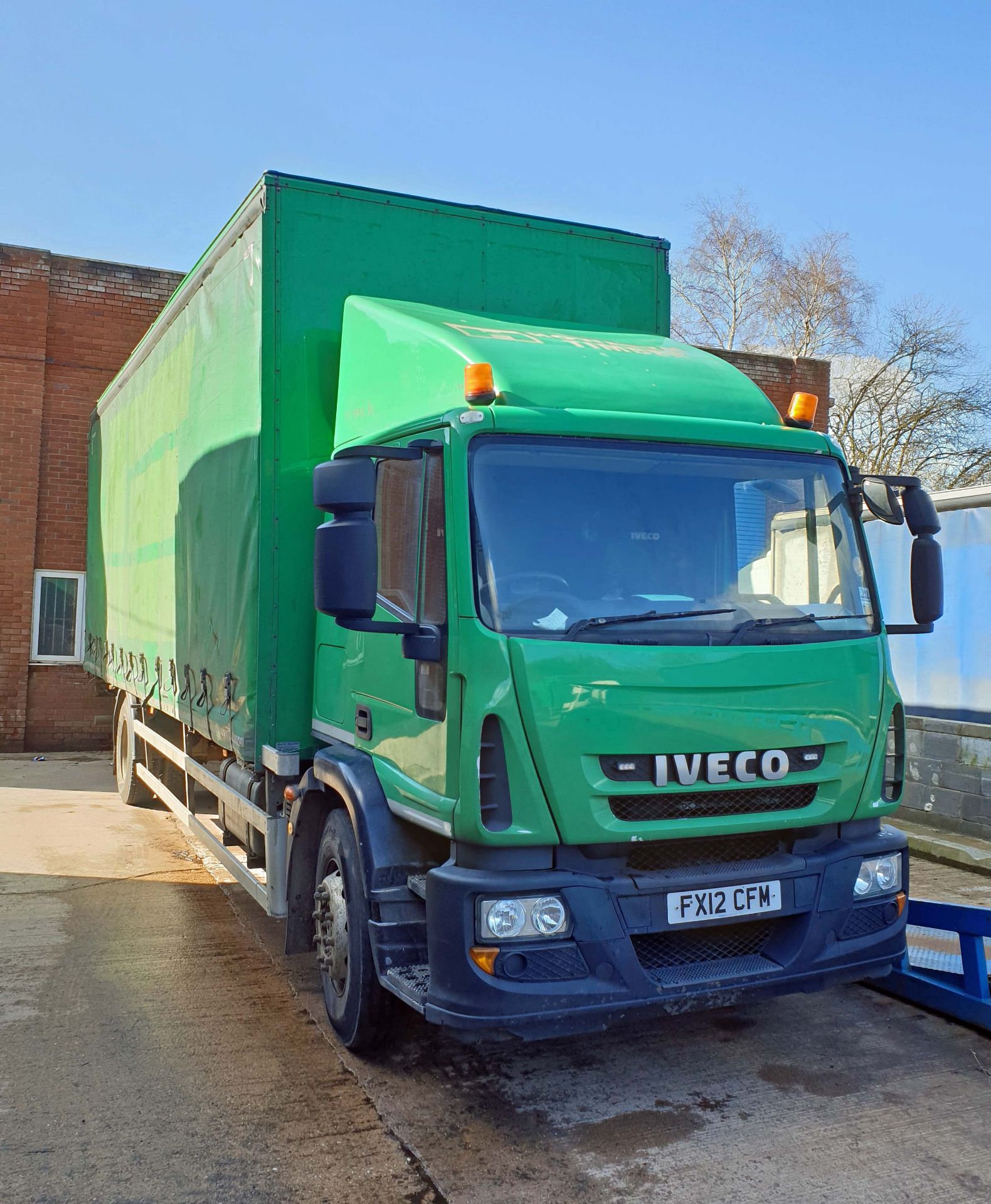 An IVECO Eurocargo ML180E25 5880cc Euro5 18-Tonne 4x2 Curtainside Truck, Registration No. FX12