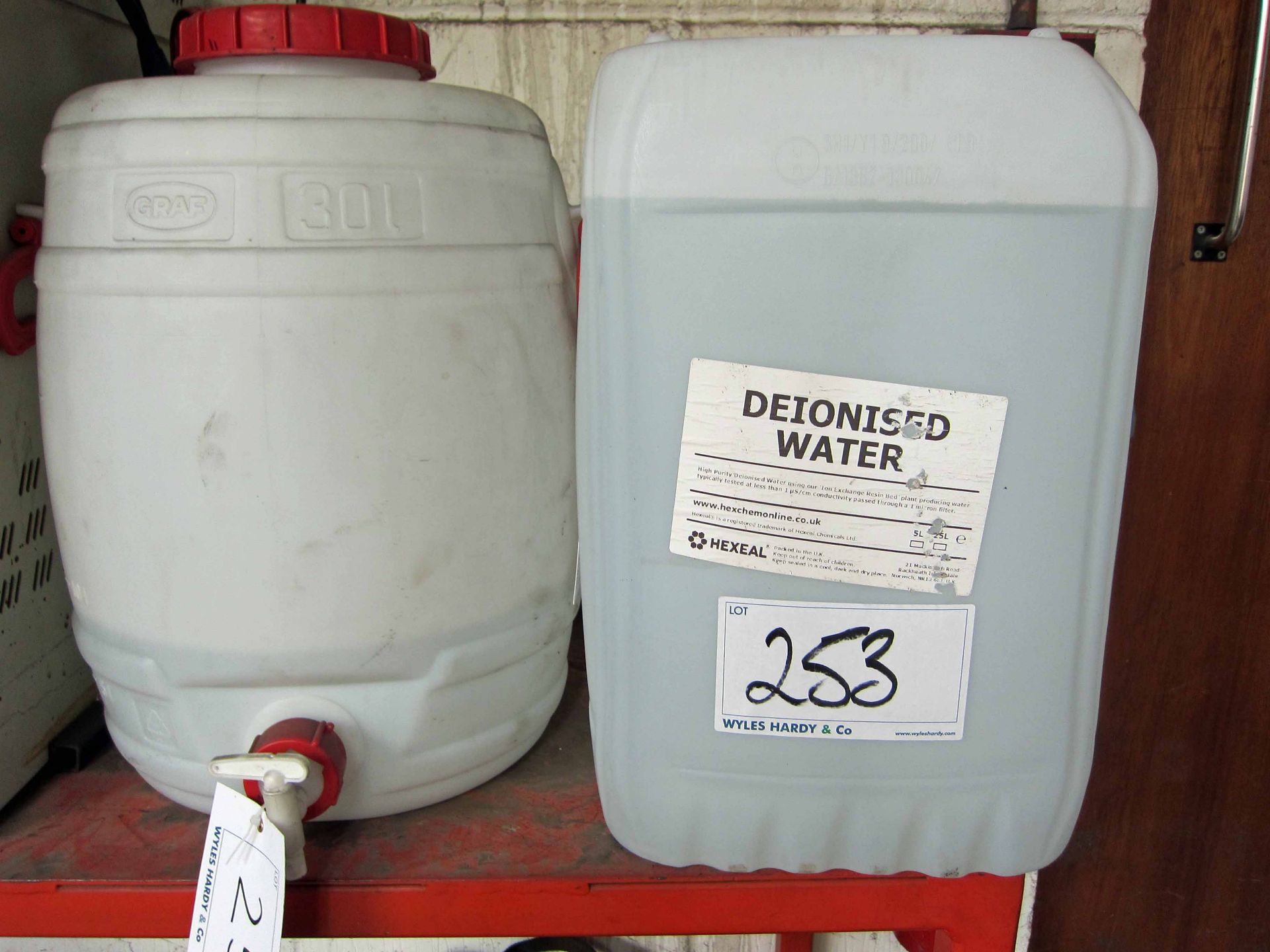 A GRAF 30-Litre Ionised Water Butt with Tap and Two Part Used 25-Litre Drums of Deionised Water