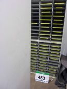 A Grey Laminate Pigeon Hole Rack with Seventy Two Bays