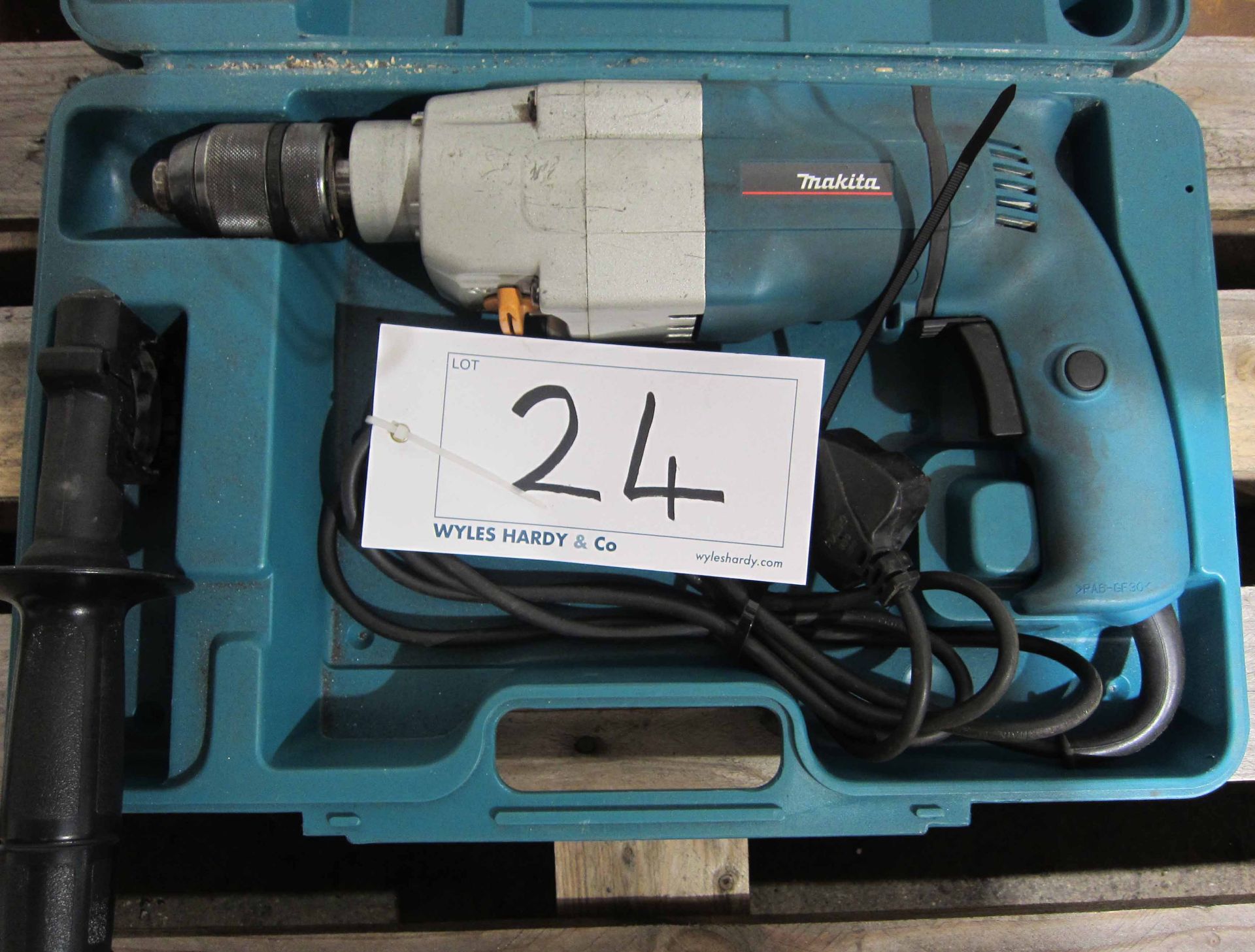 A MAKITA Model HP2033 240V 2-Speed Drill in Blow Moulded Case