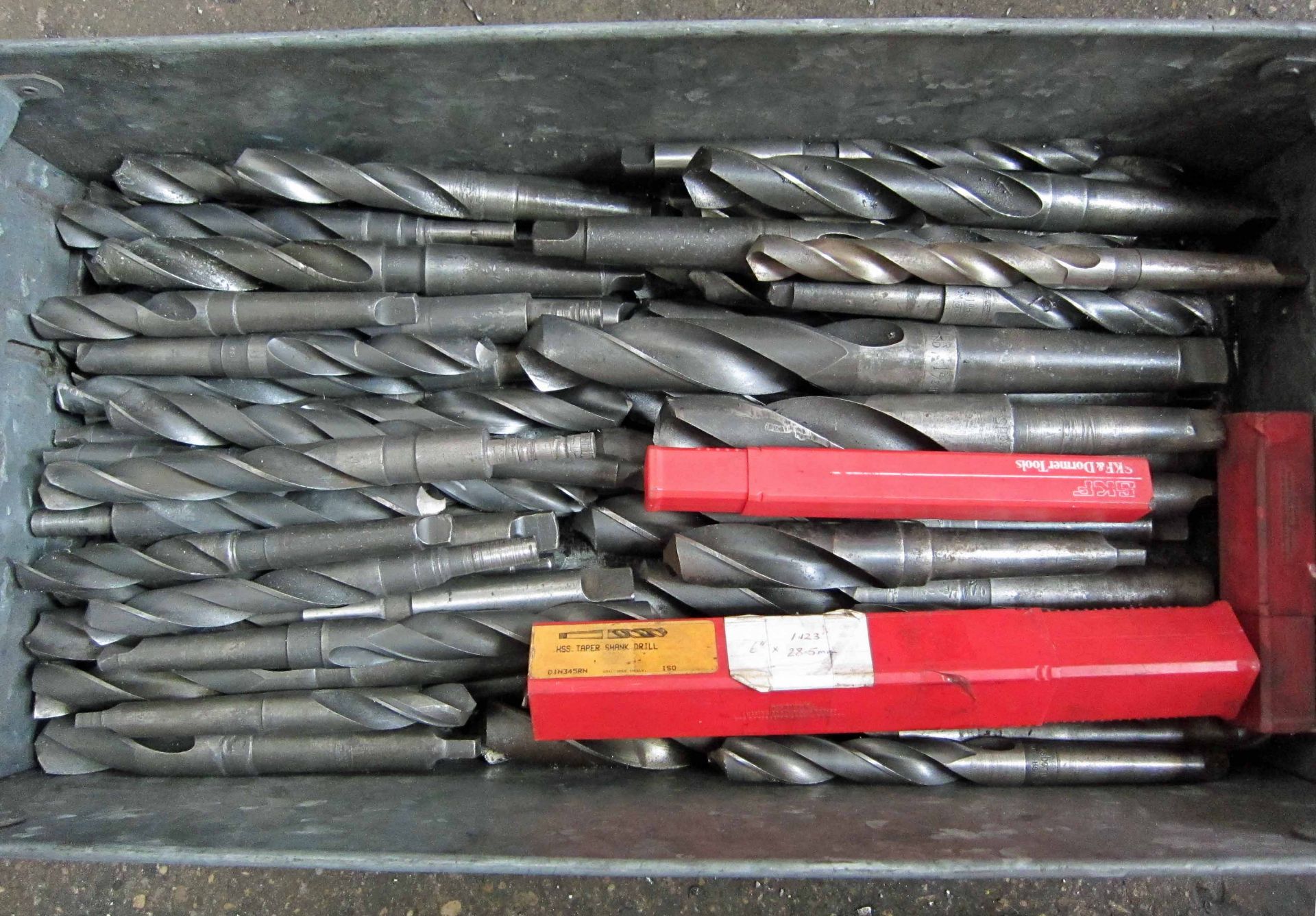 Over Fifty Various 20mm x to 34mm Drill Bits in A Steel Tote Bin - Image 2 of 2