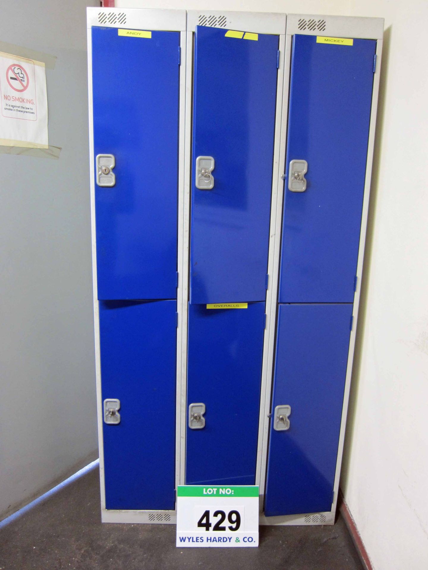 A Bank of Three Blue and Grey Steel Double Door Lockers