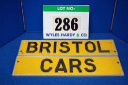 Two Number Plates bearing the Words Bristol Cars utilising Black Plastic Letters Affixed to an Alloy