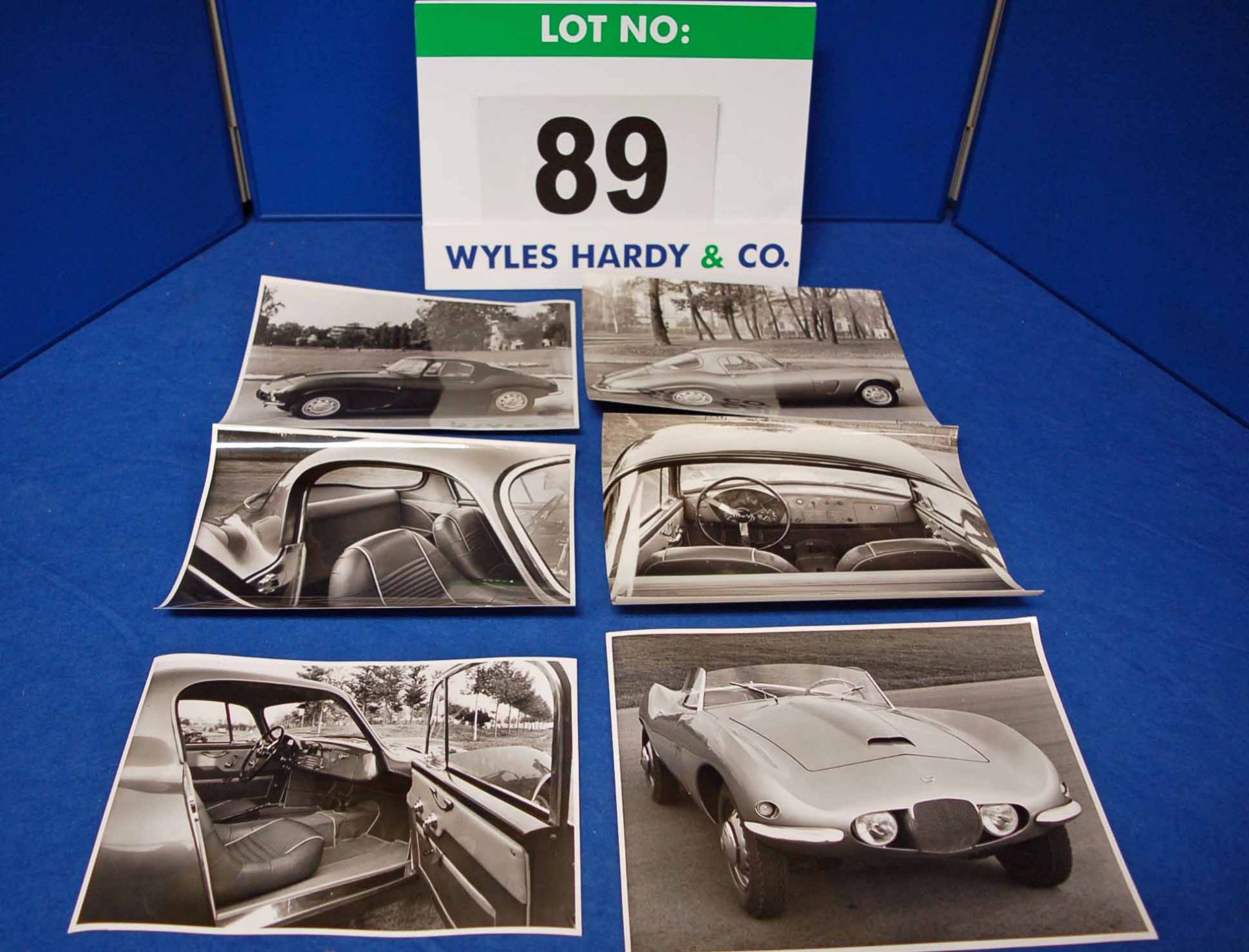 A Collection of Six Promotional Black and White Photographs of the Interior and Exterior of the