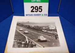 A Black and White Photograph Printed onto Card showing Three Bristol 450 Race Cars Line Astern at