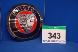 A Moulded Circular Perspex Sign bearing The Bristol Logo