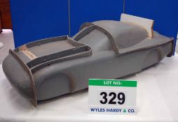 A Fibreglass Mould in Seven Sections for Scale Model of The Bristol Fighter Sports Car