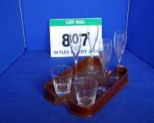 A Set of Four Champagne Flutes with A Pair of Whisky Tumblers on A Bentwood Tray