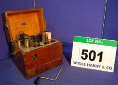 A DOBBIE AND McINNES Clockwork Recording Accelerometer in A Wooden Case