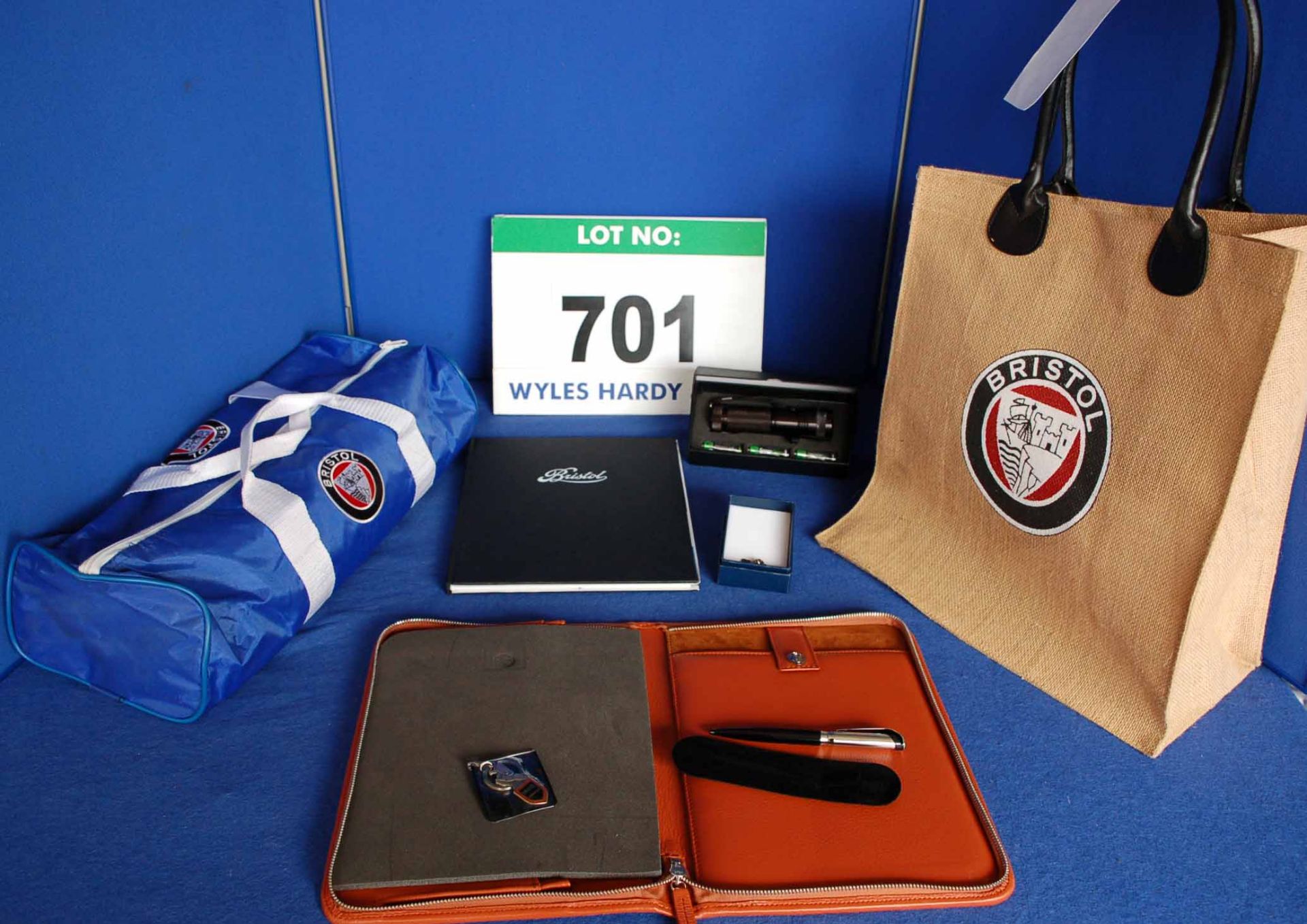 A Bristol Cars Merchandise Package comprising A Bristol Branded Hessian Bag containing A Bristol