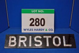 A BLUEMELS Bristol Number Plate, the Letters being Embossed into the Black Painted Rear Surface of a