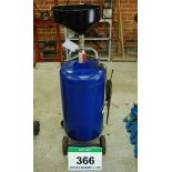 An Unbranded Pneumatic Vacuum Oil Drainer on Castors