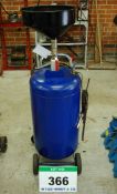 An Unbranded Pneumatic Vacuum Oil Drainer on Castors