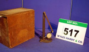 A Dial Gauge on An Adjustable Arm Bench Stand in a Wooden Case