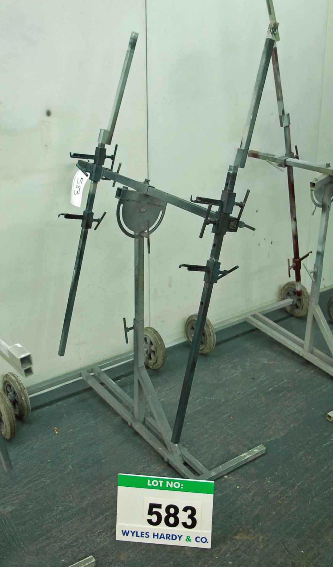 A Steel Framed Wheeled Adjustable Panel Stand