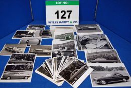 A Box Containing A Quantity of Promotional Black and White Photographs and Colour Transparencies