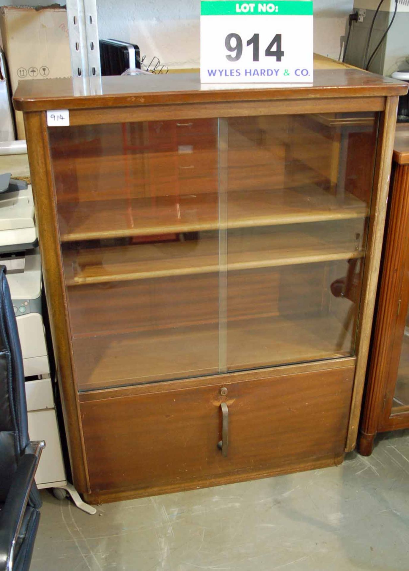 A Sapele Veneer Storage and Display Unit having Lower Single Door Storage Cupboard with Open 3-