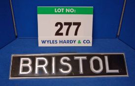 A Bristol Number Plate utilising Silver Plastic Letters Affixed to a Silver Bordered Black Painted