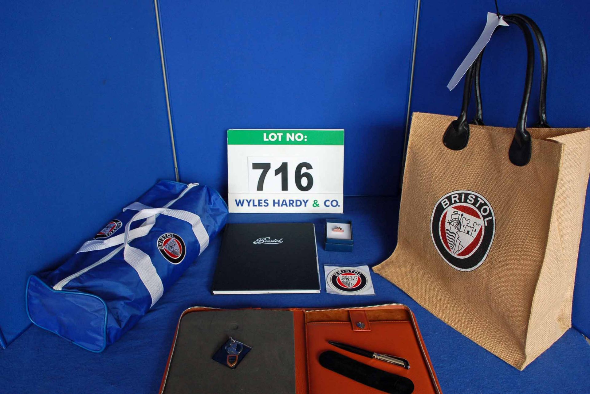 A Bristol Cars Merchandise Package comprising A Bristol Branded Hessian Bag containing A Bristol