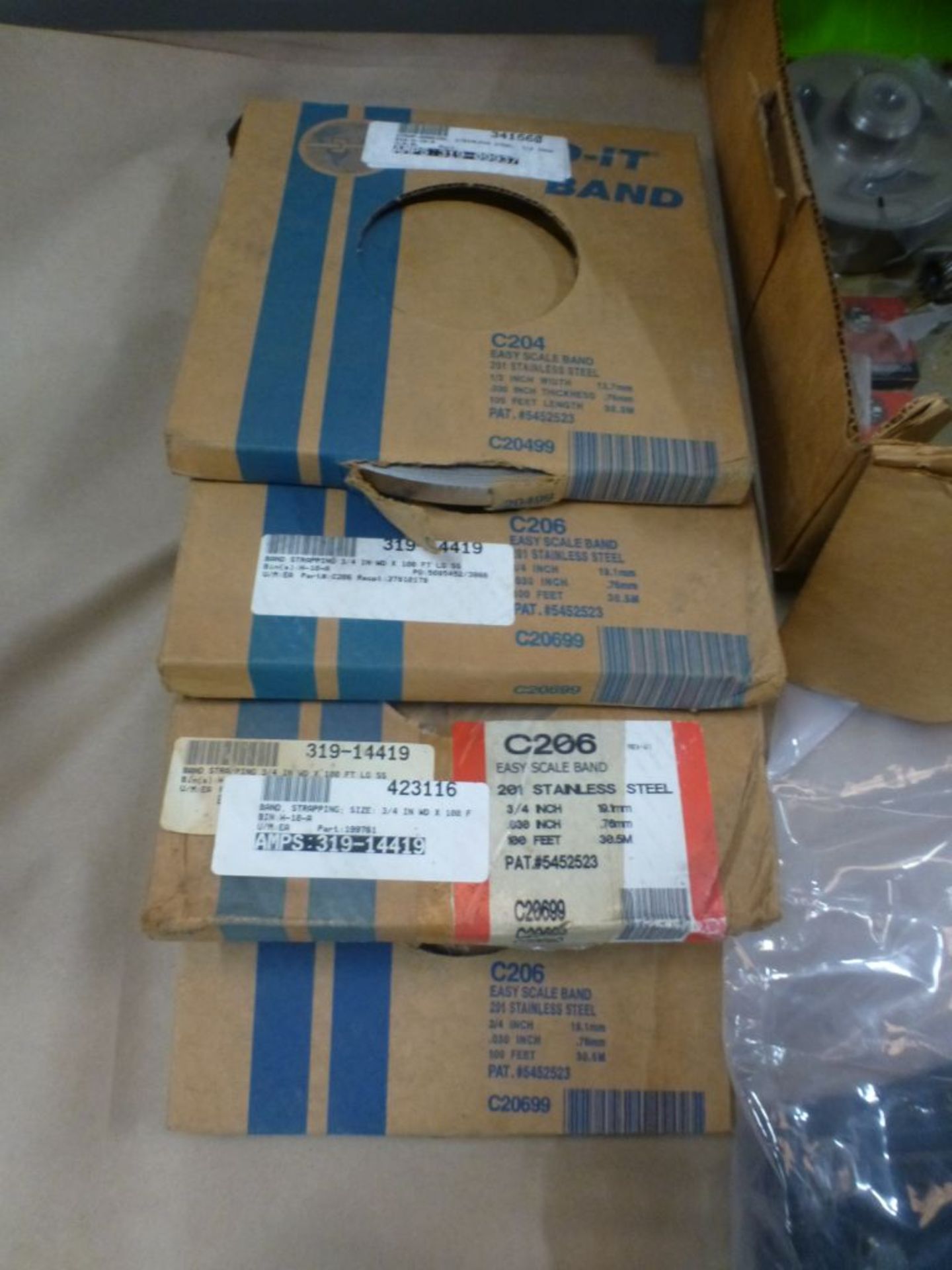 Lot of Assorted Components|Includes:; Strapping Band; Coupling; Bolt; Spare Kits|Lot Loading Fee: $5 - Image 3 of 11