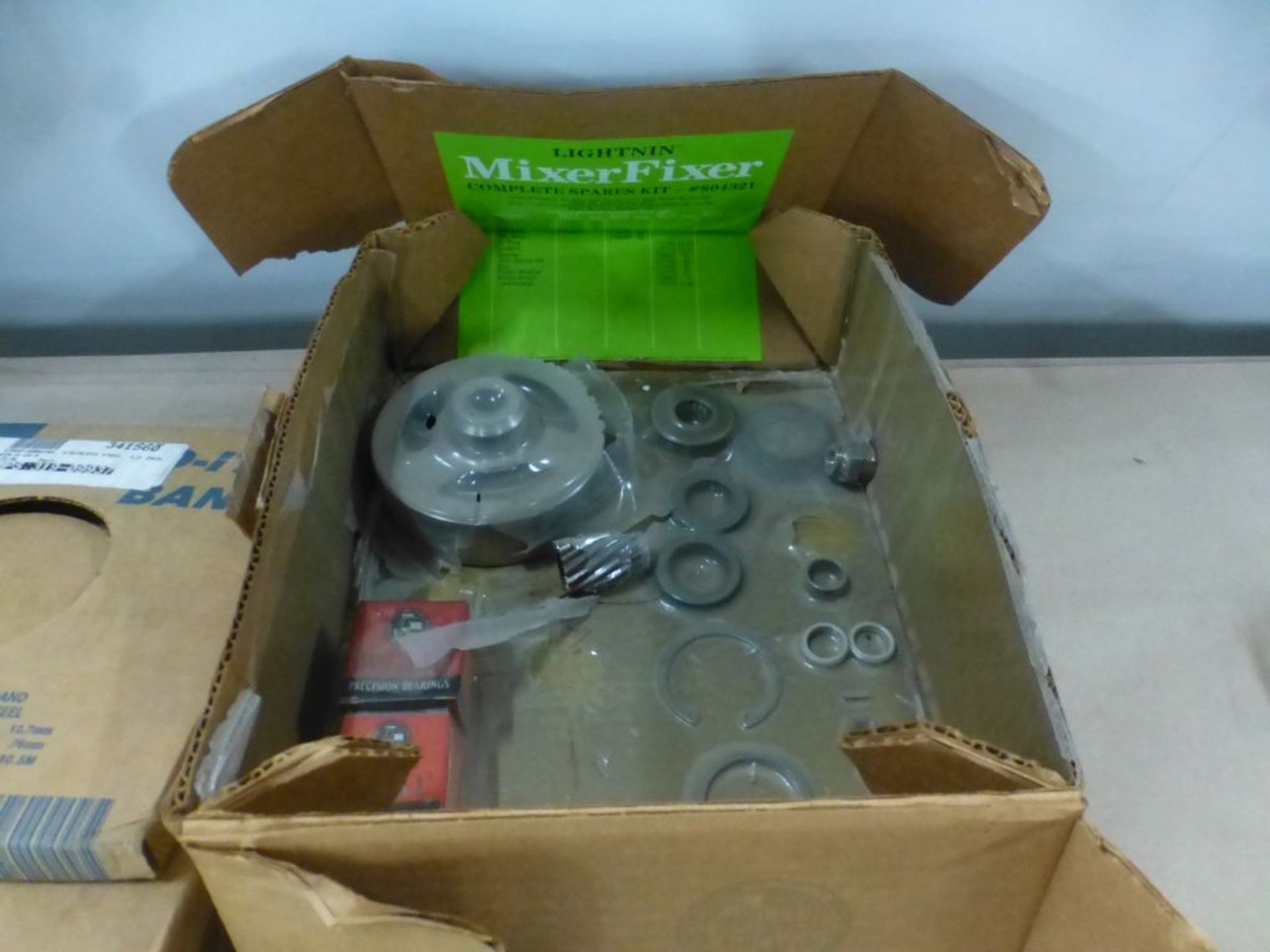 Lot of Assorted Components|Includes:; Strapping Band; Coupling; Bolt; Spare Kits|Lot Loading Fee: $5 - Image 9 of 11