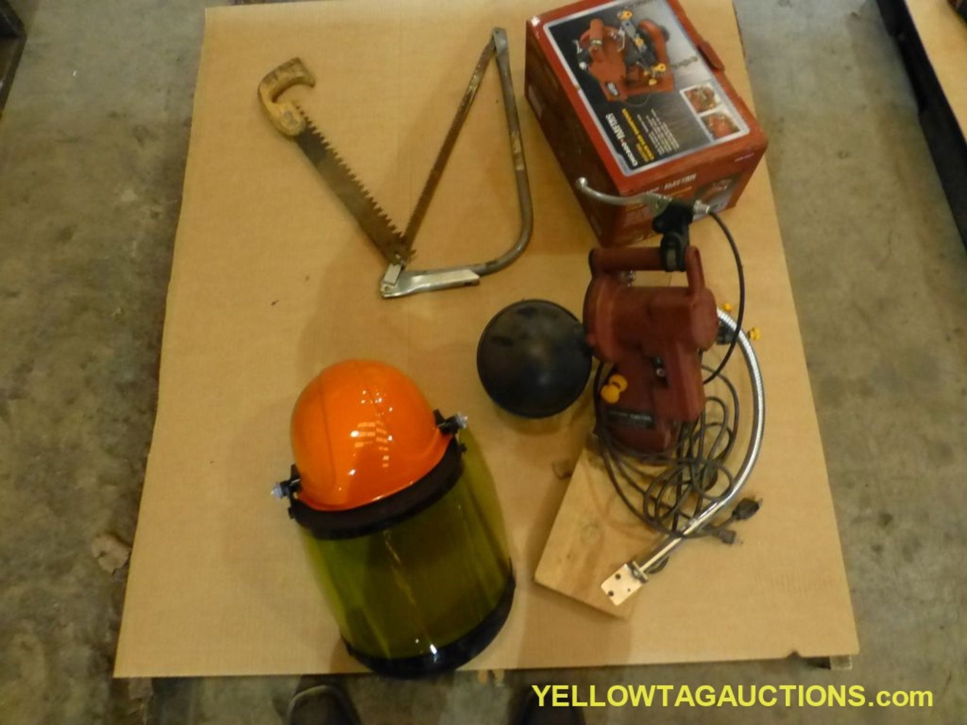 Lot of Assorted Tools | Includes:; Hand Saw; Electric Chain Saw Sharpener; Helmet