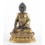 BUDDHA SHAKYAMUNI, Bronze, teilweise feuervergoldet, auf einem doppelten Lotosthron sitzend,