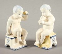 ZWEI FIGUREN BACCHANT UND PUTTO, Keramik, dezent polychrom glasiert, H bis 13,5, minimale